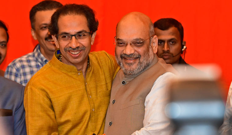 Shiv Sena president Uddhav Thackeray and BJP president Amit Shah greeting each other during a press conference in Mumbai on February 18 | Amey Mansabdar