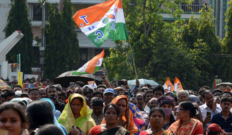 Supporters of the Trinamool Congress attend an election campaign of Chief Minister Mamata Banerjee, in Siliguri on April 13 | AFP