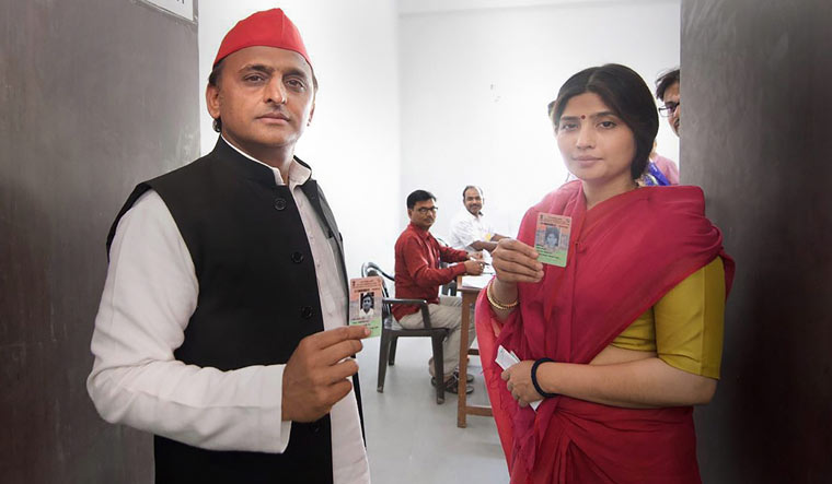 Samajwadi Party president Akhilesh Yadav and his wife Dimple Yadav before casting their votes at a polling station in Saifai on Tuesday | PTI