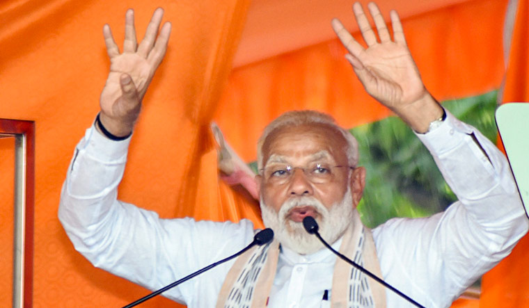 Prime Minister Narendra Modi addresses an election campaign in support of BJP's candidate Rakesh Singh for Lok Sabha polls, in Jabalpur | PTI