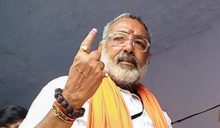 BJP candidate Giriraj Singh shows his finger marked with indelible ink at a polling station for the fourth phase of Lok Sabha elections, in Begusarai | PTI