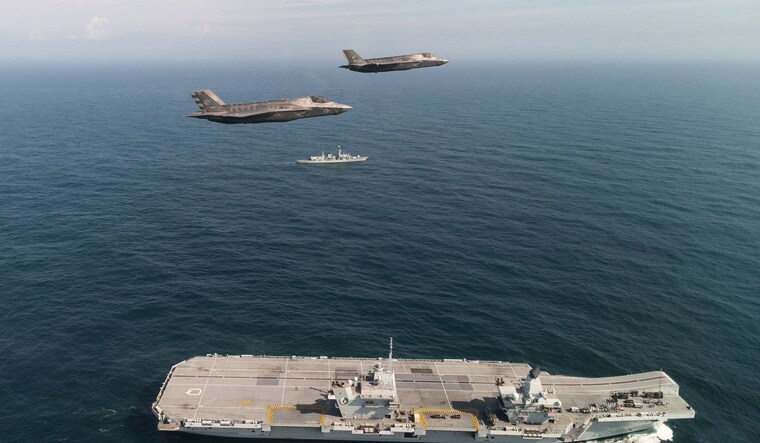Two F-35B fighters fly over the HMS Queen Elizabeth | Twitter handle of HMS Queen Elizabeth