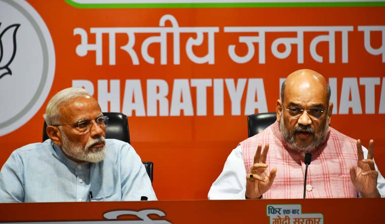 'Disciplined party worker' Modi lets Amit Shah do the talking