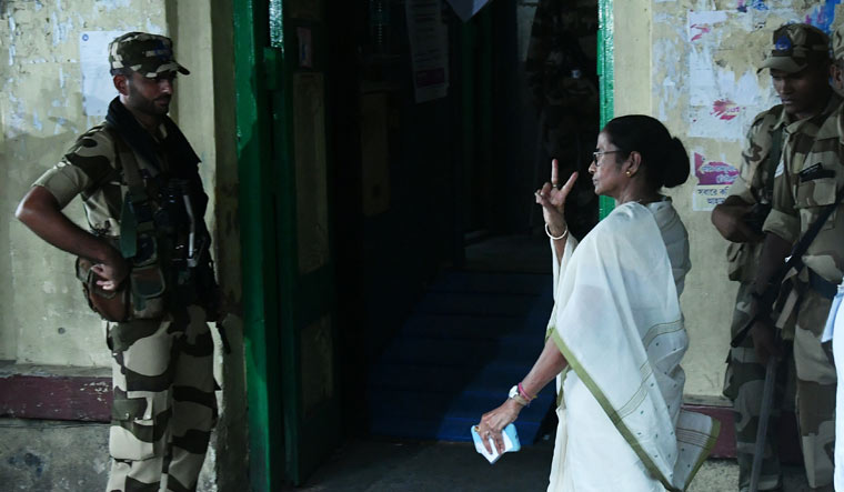 West Bengal Chief Minister Mamata Banerjee going to cast her vote at Mitra Institution in Kolkata | Salil Bera