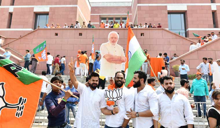 Supporters of the BJP celebrating at the party headquarters in Delhi | Sanjay Ahlawat