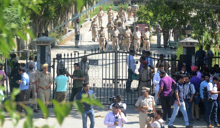 Punjab police personnel stand guard outside Pathankot's court on Monday | AFP