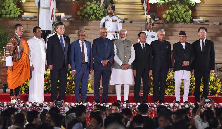 Prime Minister Narendra Modi poses for a group photograph with the President Ram Nath Kovind and BIMSTEC leaders after taking the oath of office at the Rashtrapati Bhawan in New Delhi on May 30 | AFP