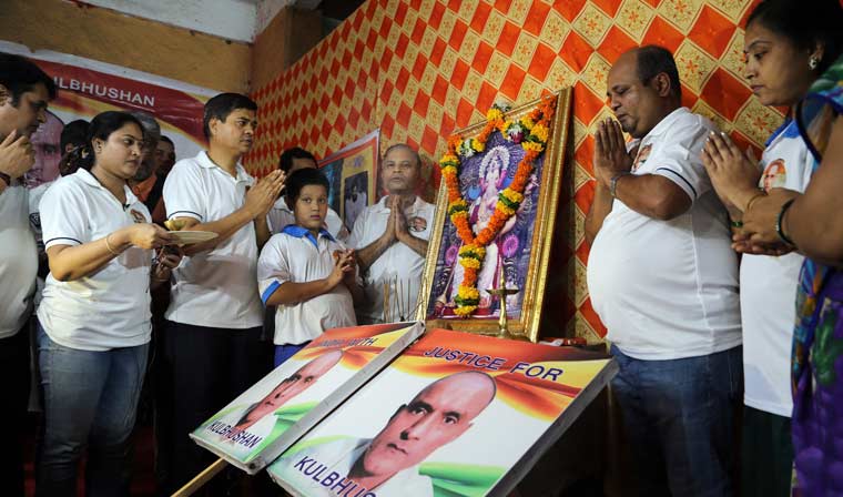 Friends of Kulbhushan Jadhav in Mumbai pray for his release ahead of the verdict of the International Court of Justice | AP 