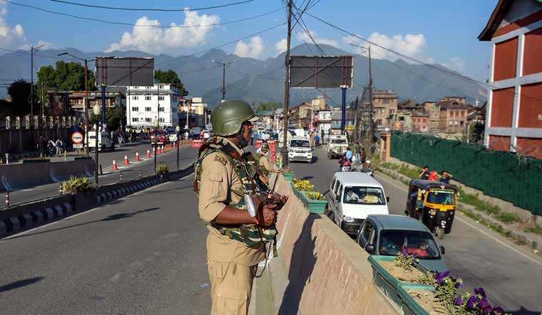 File: A security jawan stands guard during inauguration of 3.1 Km long flyover by Jammu and Kashmir Governor Satya Pal Malik, at Jehingir Chowk in Srinagar | PTI