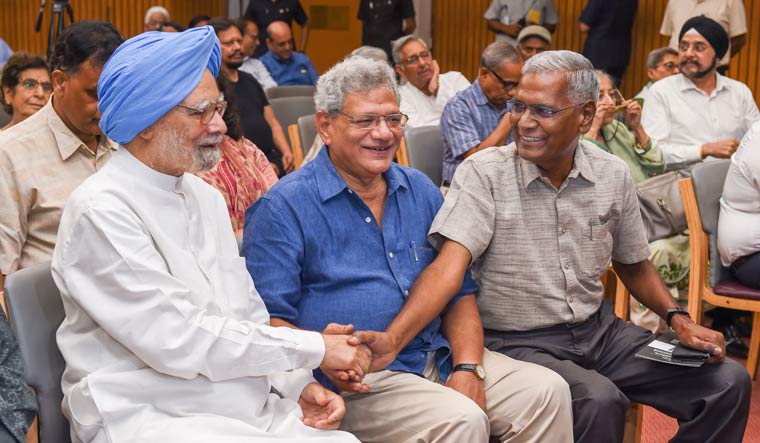 Former prime minister Manmohan Singh, and Left leaders Sitaram Yechury and D. Raja during a condolence meeting of former Congress leader Jaipal Reddy who passed away last month, in New Delhi | PTI