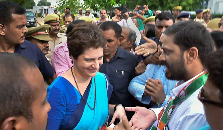 Congress general secretary Priyanka Gandhi Vadra being welcomed by party cadres on her arrival at the airport in Varanasi | PTI