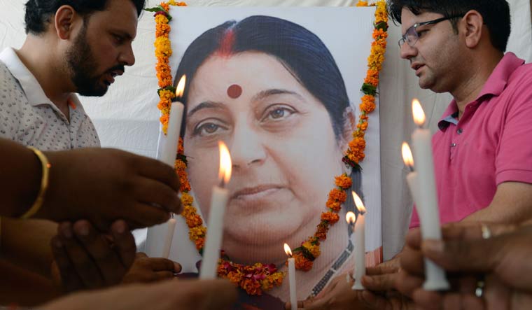 [File] BJP workers pay tribute to former foreign minister Sushma Swaraj in Amritsar on August 7 | AFP