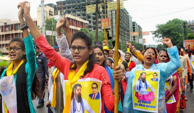 Members of Ahirwar Community take part in protest rally against the demolition of a Sant Ravidas temple in New Delhi | PTI