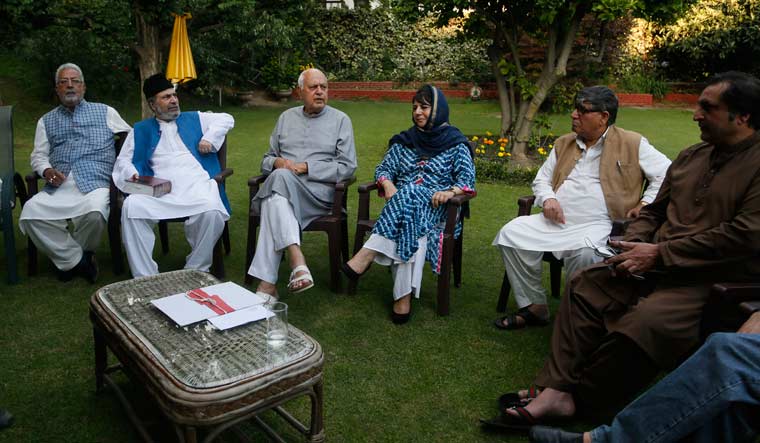 Former Jammu and Kashmir chief minister Mehbooba Mufti, National Conference president Farooq Abdullah and other leaders attend an all parties meeting in Srinagar | PTI