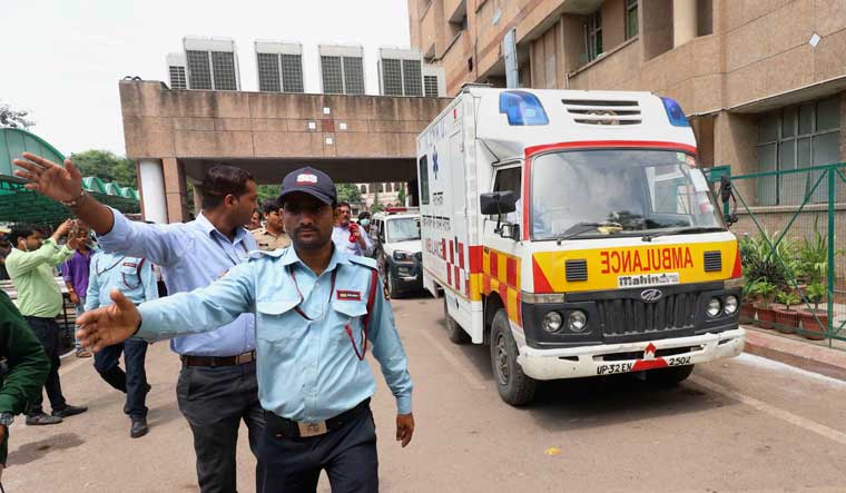 An ambulance carries the Unnao rape survivor's lawyer to be airlifted to New Delhi, from Lucknow Trauma Center in Lucknow | PTI
