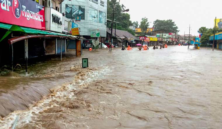 A flooded street following incessant monsoon rainfall, at Kalpetta in Wayanad | PTI