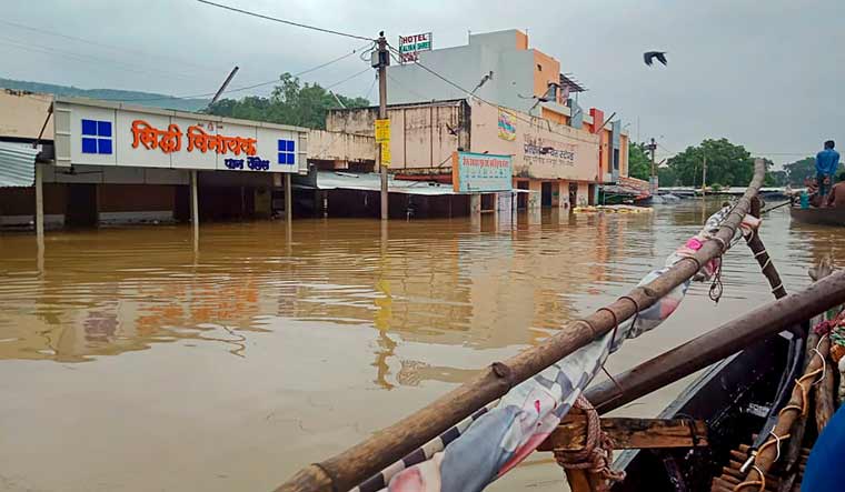 A view of buildings submerged in flood waters following heavy monsoon rainfall in Neemuch district of Madhya Pradesh | PTI