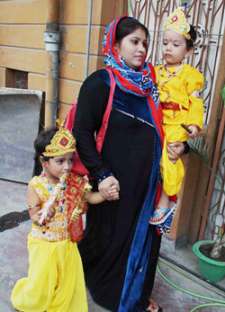 [File] A Muslim woman with her children dressed up as Lord Krishna on Janmashtami | PTI