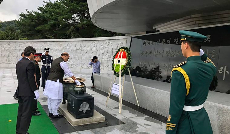 Defence Minister Rajnath Singh lays a wreath at the National Cemetery of Republic of Korea, in Seoul | PTI