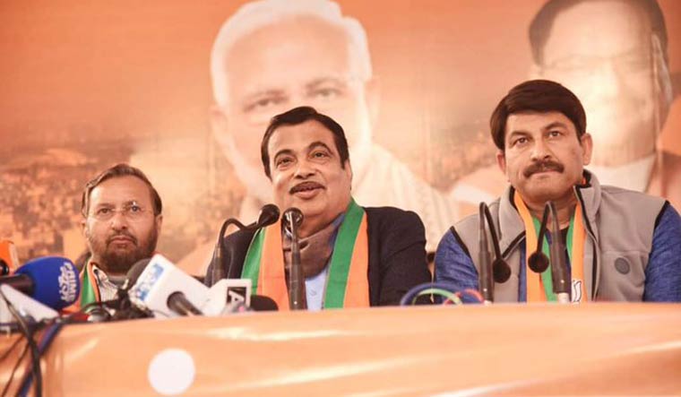 Union minister Nitin Gadkari releases BJP manifesto for Delhi Assembly elections at party office in New Delhi | PTI