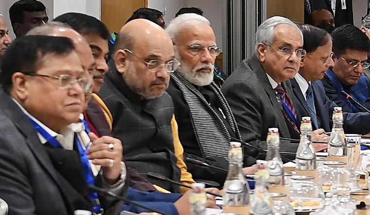 Prime Minister Narendra Modi interacts with the economists and experts in a meeting, at NITI Aayog, in New Delhi | PTI