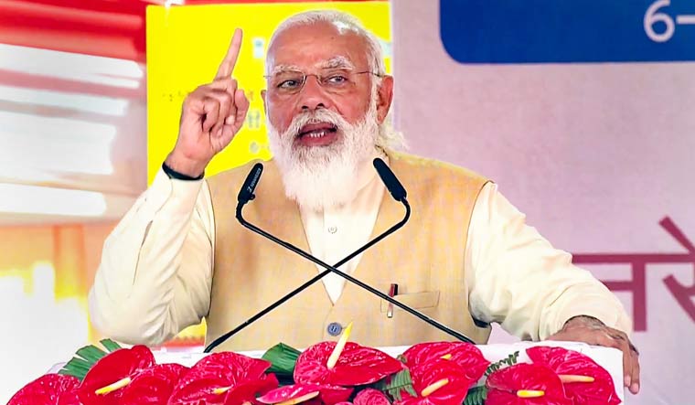 Prime Minister Narendra Modi speaks during the inauguration of widened Prayagraj-Varanasi section of NH-19, in Varanasi | PTI