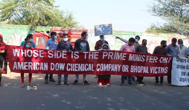 A human chain formed by the survivors on the 36th anniversary of Bhopal gas tragedy, in front of abandoned Union Carbide factory