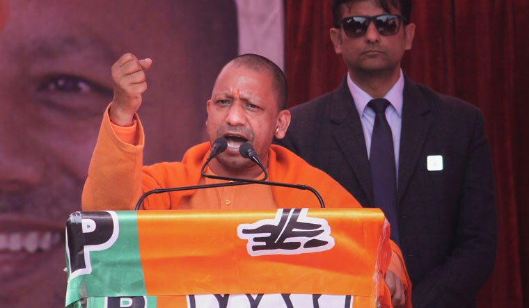Uttar Pradesh Chief Minister Yogi Adityanath addresses an election campaign meeting in support of BJP candidates for the upcoming Delhi Assembly elections, at Jahangir Puri, in New Delhi | PTI