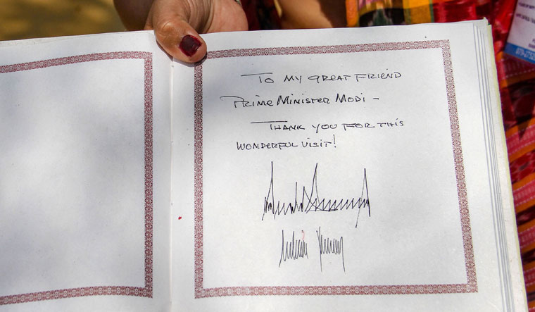 A view of the Sabarmati Ashram's visitor's book signed by US President Donald Trump and First Lady Melania Trump during their visit | PTI