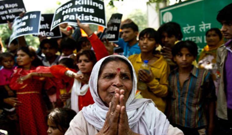 Hindu refugees from Pakistan protest in New Delhi against the religious atrocities in their country | AFP