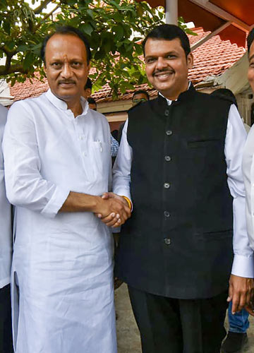 [File] Former Maharashtra CM Devendra Fadnavis with Ajit Pawar | PTI