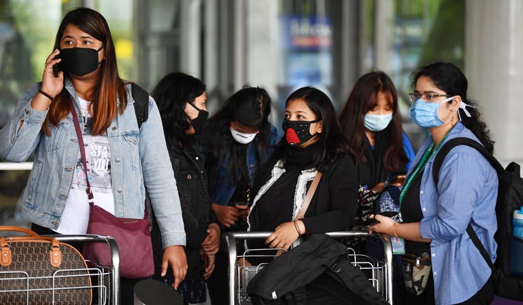 People are seen wearing face masks in view of coronavirus scare in Kolkata | Salil Bera