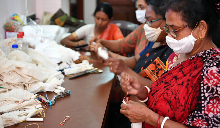 Women are making face masks in the wake of coronavirus outbreak at Ganguly Bagan in Kolkata | Salil Bera
