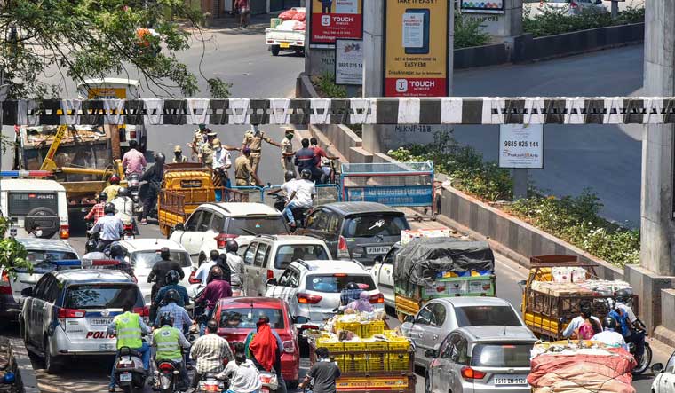 Police personnel stop commuters during lockdown in the wake of deadly coronavirus, in Hyderabad | PTI