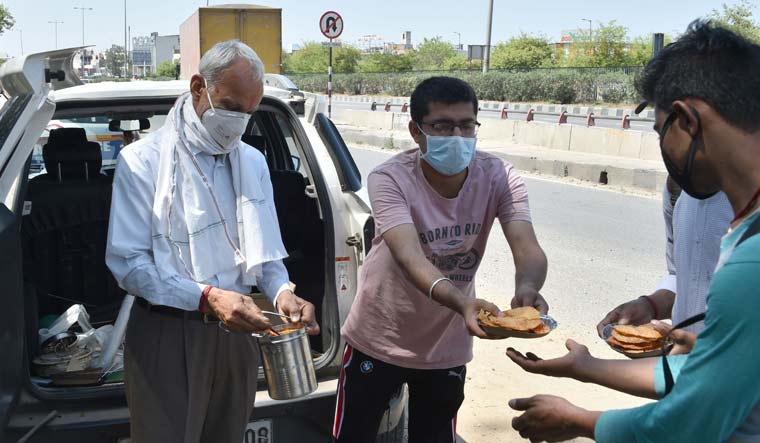 migrants-served-food-ayush-goel