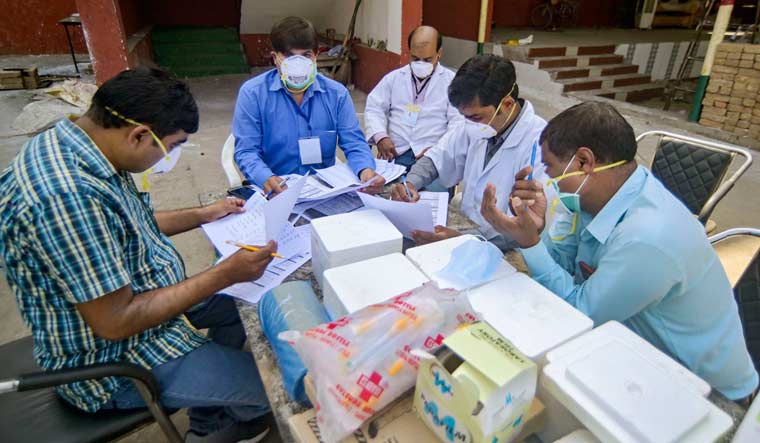 Prayagraj: Medics examine attendees of the religious congregation at Tabligh-e-Jamaat's Markaz in Delhi's Nizamuddin area, in Prayagraj, Wednesday, April 1, 2020 | PTI