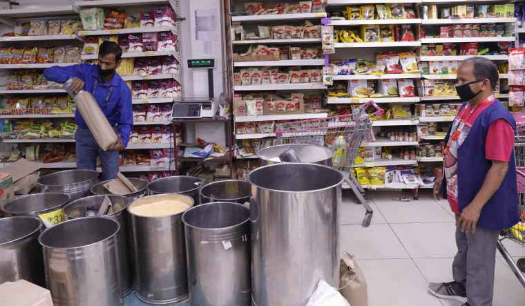 Employees packing essentials at a store in Lucknow | Pawan Kumar