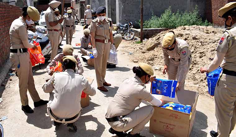 Spike in COVID-19 cases pushes overworked Punjab police to the ...