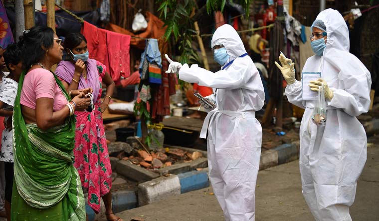 Health workers visiting a slum area in Kolkata | Salil Bera