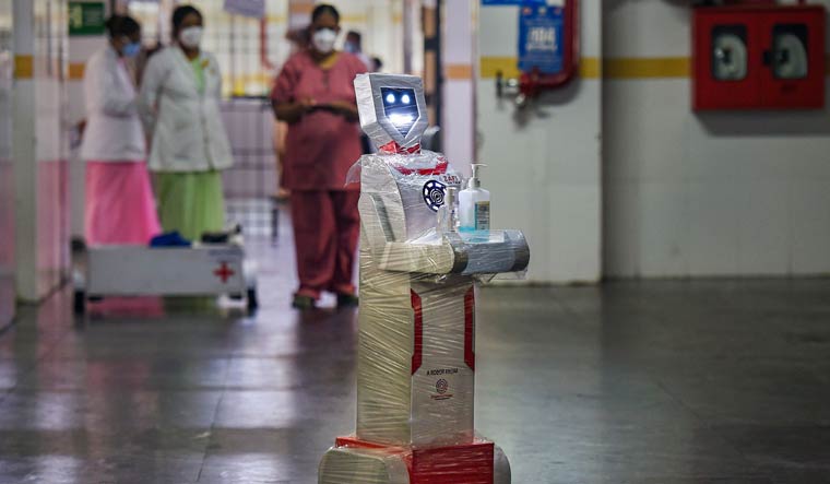 Medical staff participates in a demo of the interactive robot 'Zafi' which will be deployed at COVID-19 isolation wards, at Stanley Medical hospital in Chennai | PTI