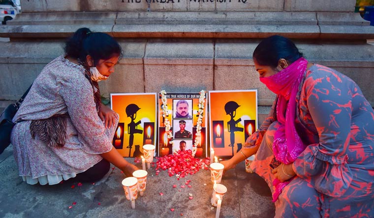 Citizens light candles in solidarity with the Indian army personnel martyred during a clash with Chinese troops in Ladakh's Galwan valley, in Bengaluru | PTI