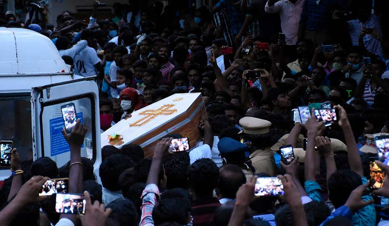 Residents gather as they carry the coffin of Jayaraj and son Bennicks Immanuel, allegedly tortured at the hands of police in Sathankulam | AFP