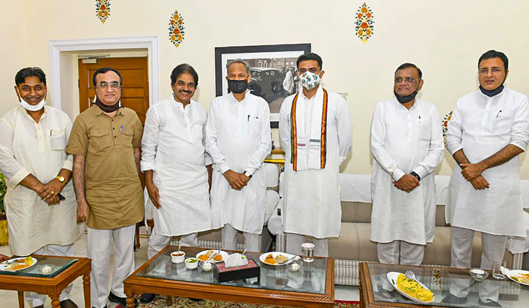 Rajasthan Chief Minister Ashok Gehlot along with senior Congress leaders Sachin Pilot, Avinash Pandey (2nd R), Randeep Surjewala (R), Govind Singh Dotasara (L), Ajay Maken (2nd L) and KC Venugopal (3rd L), in Jaipur | PTI