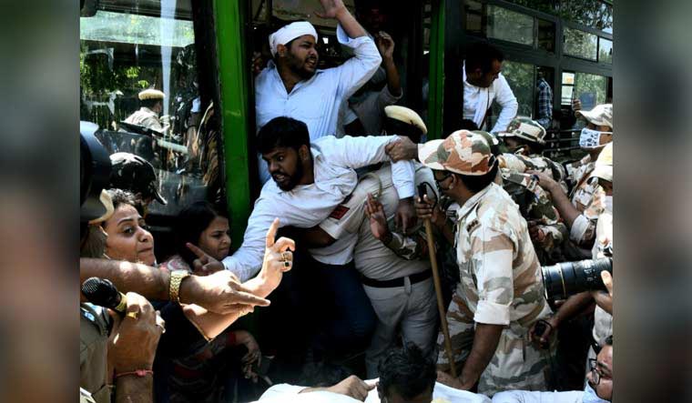 Police remove protesters from the premises of UP Bhawan in Delhi | Aayush Goel