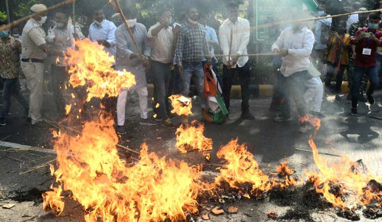 Congress workers stage a protest in front of UP Bhavan in Delhi against the gang rape and death of a 19-year-old woman in Hathras | Aayush Goel