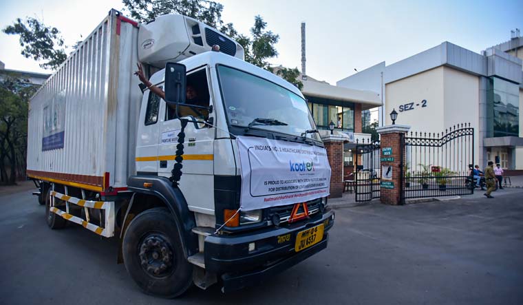 A truck, to be used used to transport COVID-19 vaccines, reaches Serum Institute of India for loading, in Pune | PTI