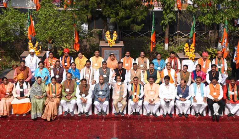 Chief Minister Shivraj Singh Chouhan with new BJP state executive committee members in Bhopal