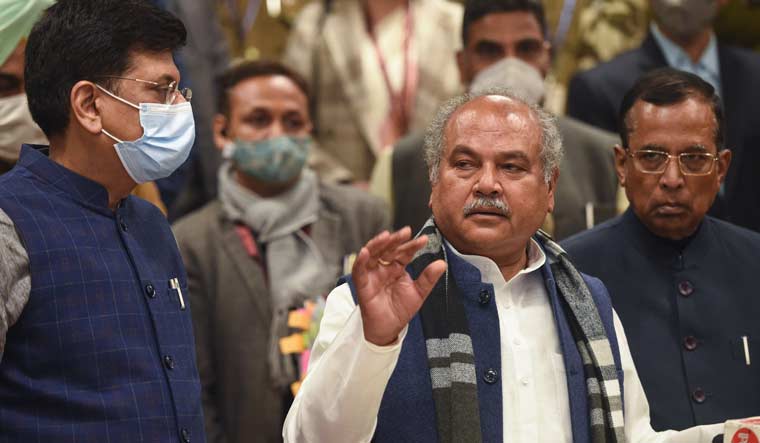 Union Minister for Agriculture Narendra Singh Tomar (C), along with Minister for Commerce and Industry Piyush Goyal (L) and Minister of State Som Prakash, addresses media after the 10th round of meeting with farmer leaders on new agri law at Vigyan Bhawan | PTI