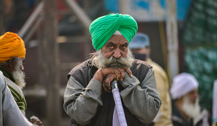 A farmer at Singhu border during their ongoing agitation against Centre's farm reform laws, in New Delhi | PTI