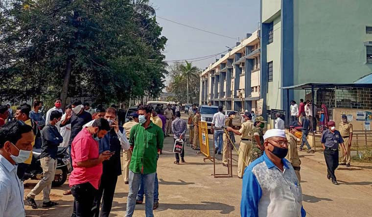 Police personnel guard outside the Bhandara district General Hospital after a fire broke out in its new born babies care unit | PTI